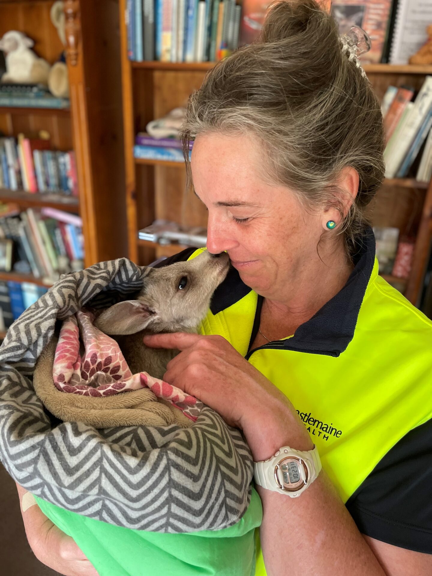 Kirsty White with a Kangaroo at the Redbox Wildlife Shelter