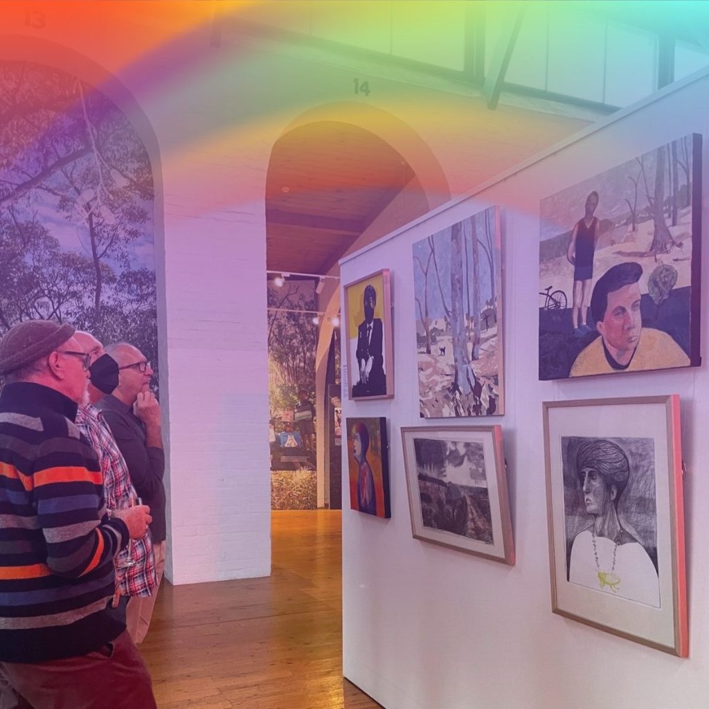 Art gallery with paintings hanging on the wall and a rainbow colour overlaying the image.