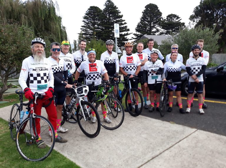 Castlemaine Rouleurs cycle team, riders standing next to their bicycles