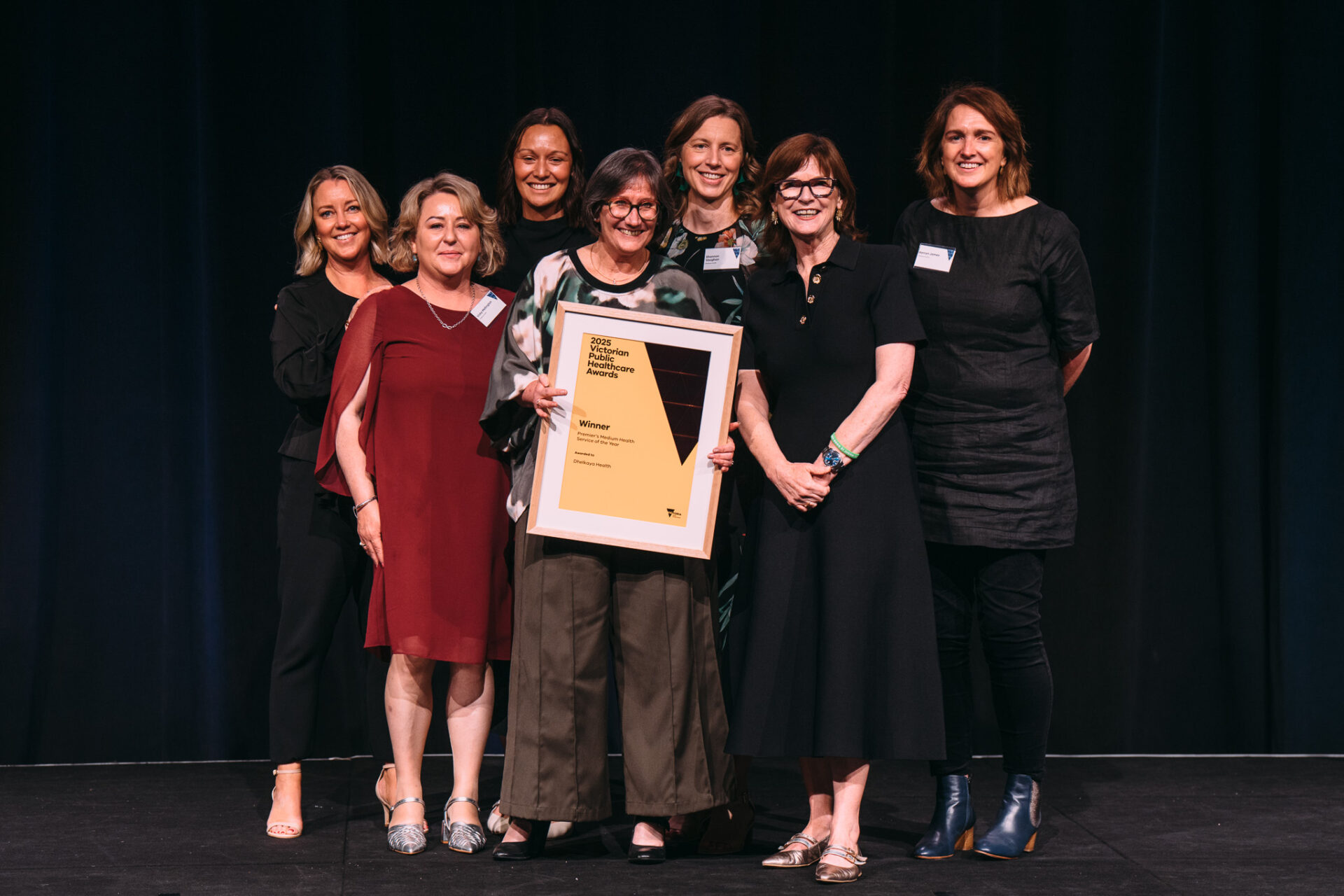 Victorian Public Healthcare Award winners holding certificate with Mary-Anne Thomas MP